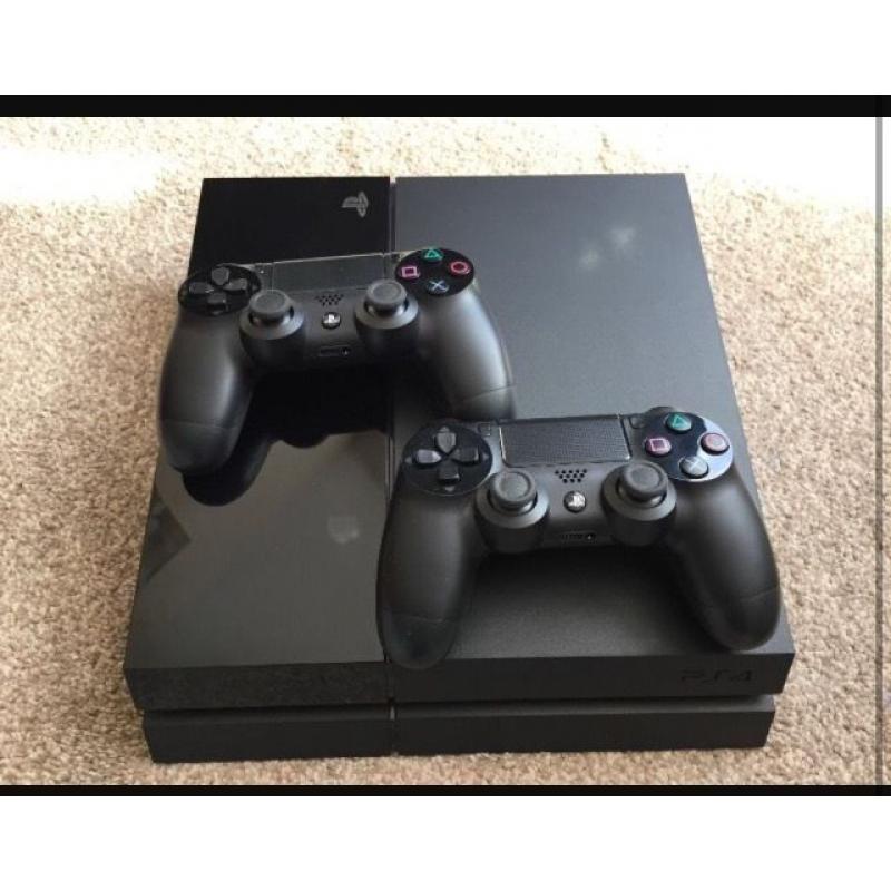 PlayStation 4 with 2 controllers and games