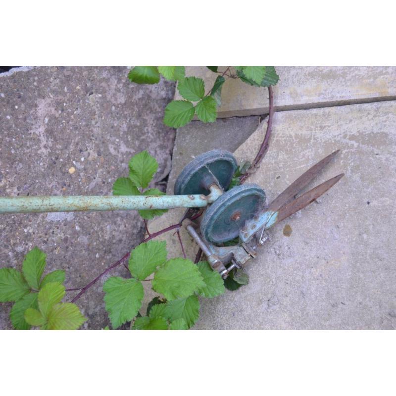 Retro Garden Tool or Ornament - Grass Edging Sheers or Scissors on Wheels
