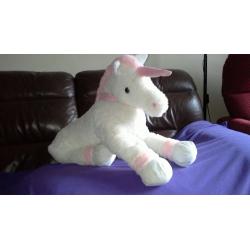 Large white Unicorn with pink ankles, horn, mane and tail. Great soft toy.