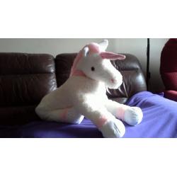 Large white Unicorn with pink ankles, horn, mane and tail. Great soft toy.