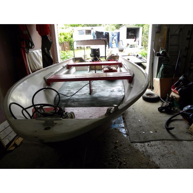 For sale 14ft aluminium boat trailer and 25hp Yamaha outboard.