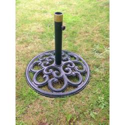 Large parasol and solid iron base.