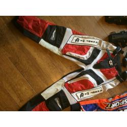 Motorcross Body armour x2, shin/knee guards x2, trousers x2 (small adult and kids)