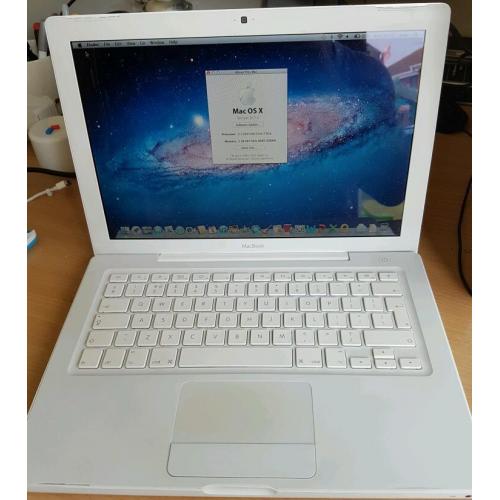 Macbook a1181, white, good condition, + new charger,160gb hdd, 2gb ram + software