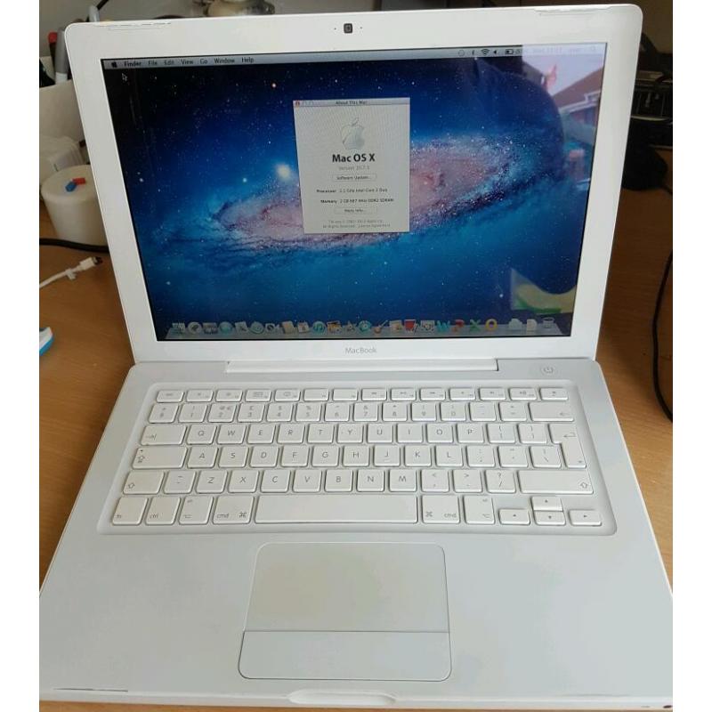 Macbook a1181, white, good condition, + new charger,160gb hdd, 2gb ram + software