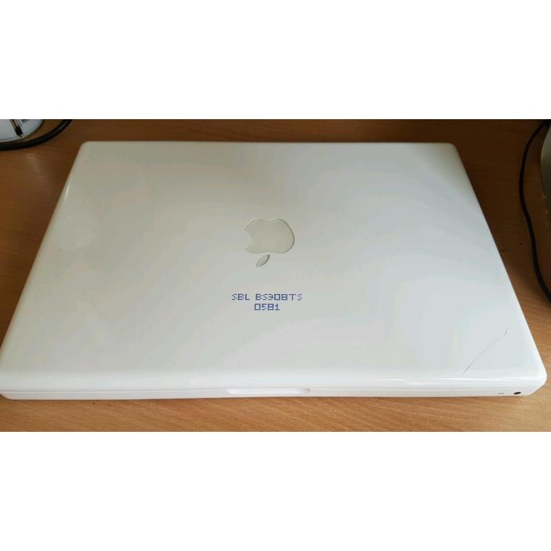 Macbook a1181, white, good condition, + new charger,160gb hdd, 2gb ram + software