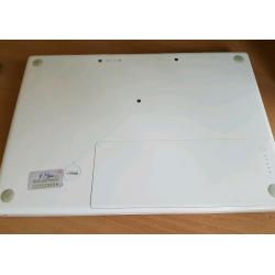 Macbook a1181, white, good condition, + new charger,160gb hdd, 2gb ram + software