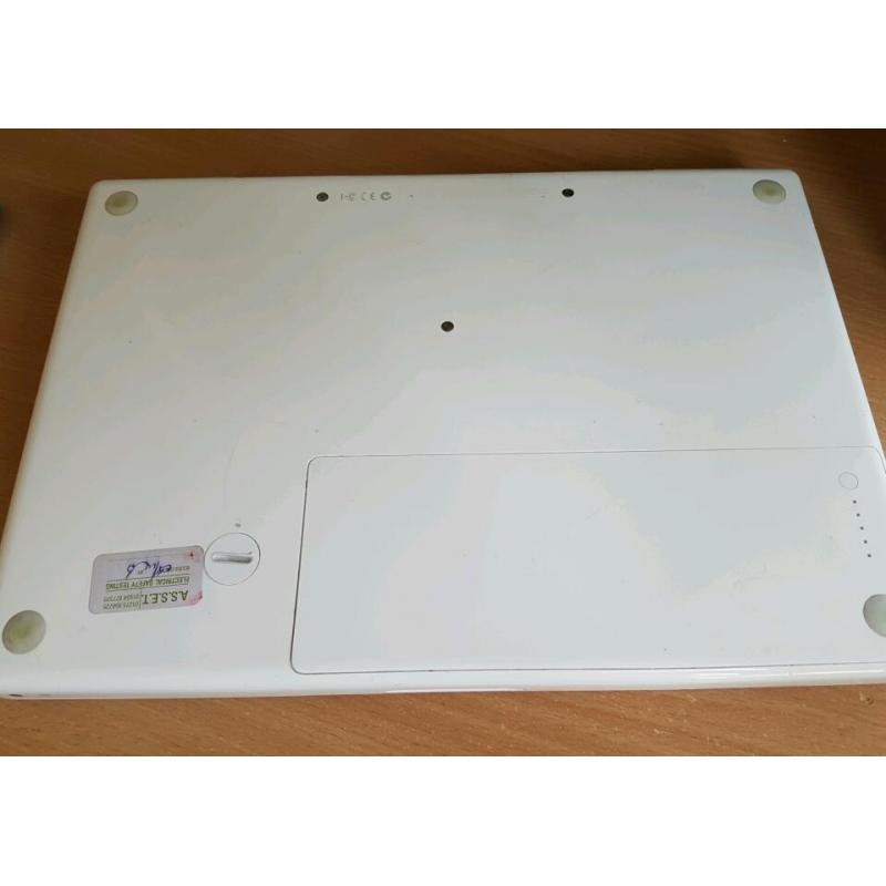 Macbook a1181, white, good condition, + new charger,160gb hdd, 2gb ram + software