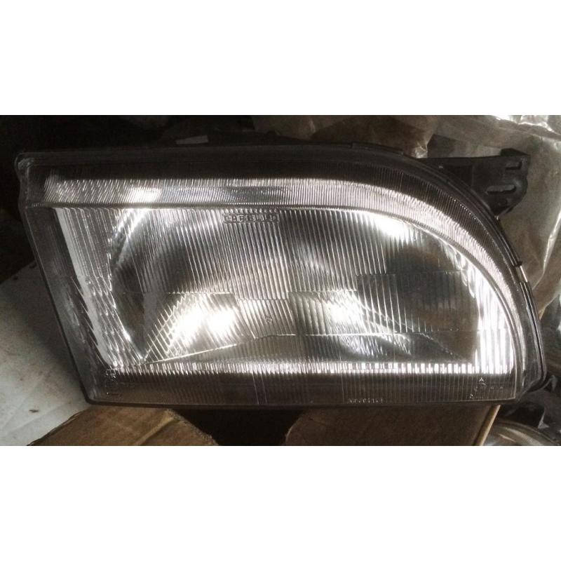 TRANSIT O/S HEADLIGHT NEW IN FORD BOX