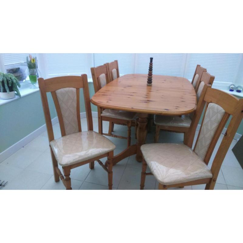 Solid Oak extendable dining table with 6 chairs