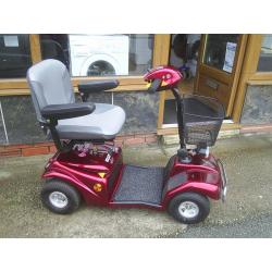 RASCAL MOBILITY SCOOTER in red, really good condition, good batteies
