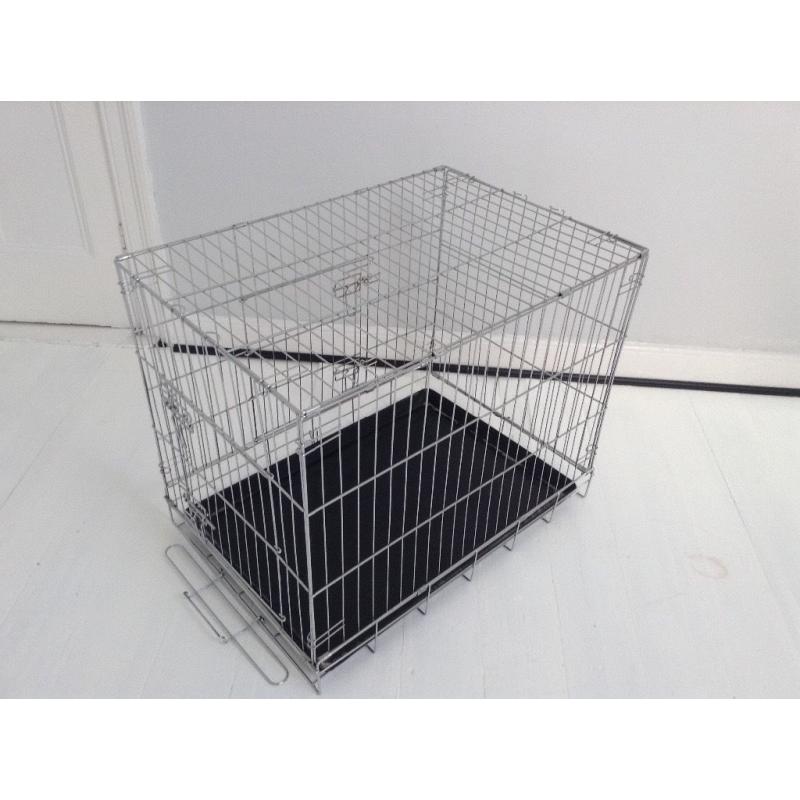 Large metal pet cage. Good condition.