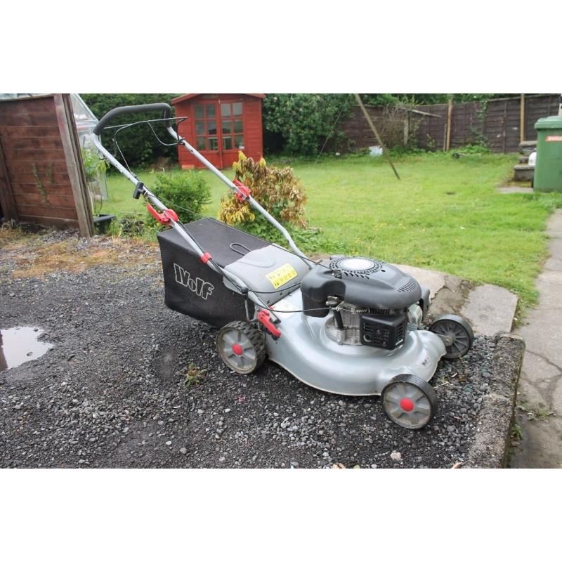 Wolf four stroke 5hp self propelled lawn mower excellent suit large lawn