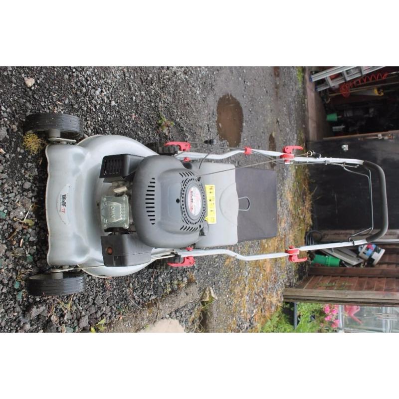 Wolf four stroke 5hp self propelled lawn mower excellent suit large lawn