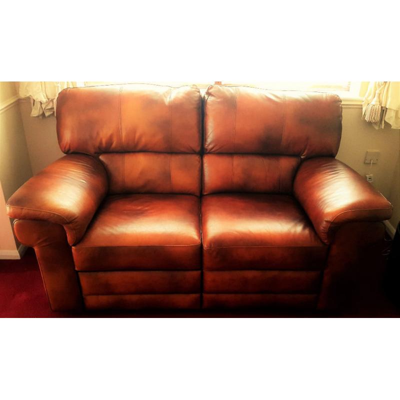 Luxury 2 seater reclaining leather sofa. Shine antique brown colour