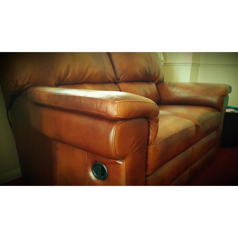 Luxury 2 seater reclaining leather sofa. Shine antique brown colour