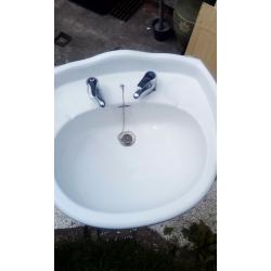 Victoeian style sink and pillar candle stand