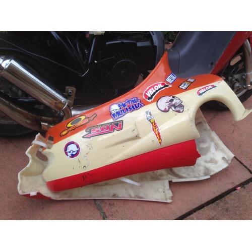 Mini motor in the style of a retro scooter