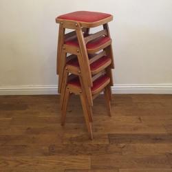 Vintage retro set of solid wood stacking stools.