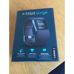 Fitbit surge, boxed