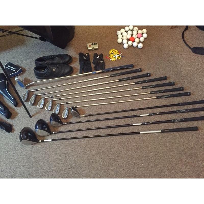 Complete set of golf clubs