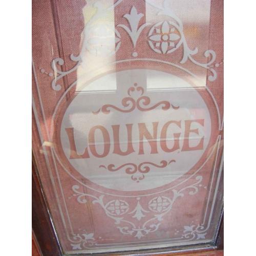 Vintage ornate pub lounge acid etched glass panel in hardwood frame. Glass measures 37" x 20".