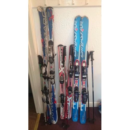 3 pairs of skis including poles, excellent condition