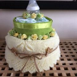 Bespoke new mum/mum-to-be gifts. Baby clothes bouquets, nappy cakes, clothes cupcakes and hampers