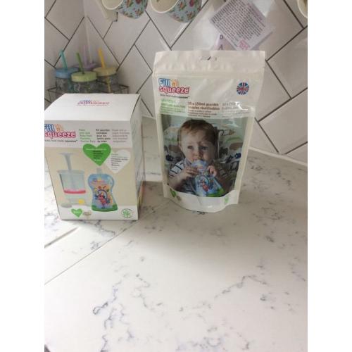 Brand new- Fill n Squeeze starter kit plus 10 additional pouches