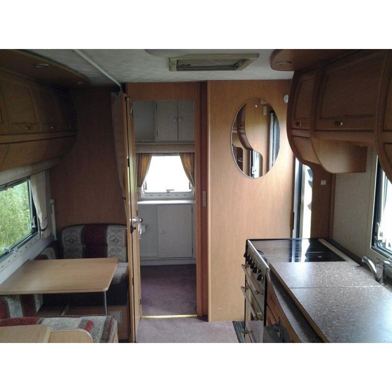 Coachman VIP 520/4 - 2002 parked at Wold Cottage Touring Park, Wold Newton Yorkshire