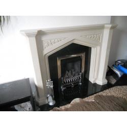 Stone effect fireplace with black marble insert