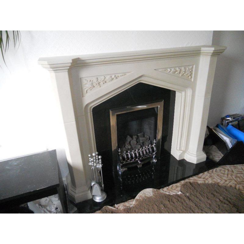 Stone effect fireplace with black marble insert