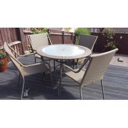 Rattan table and 4 chairs