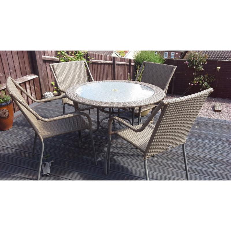 Rattan table and 4 chairs