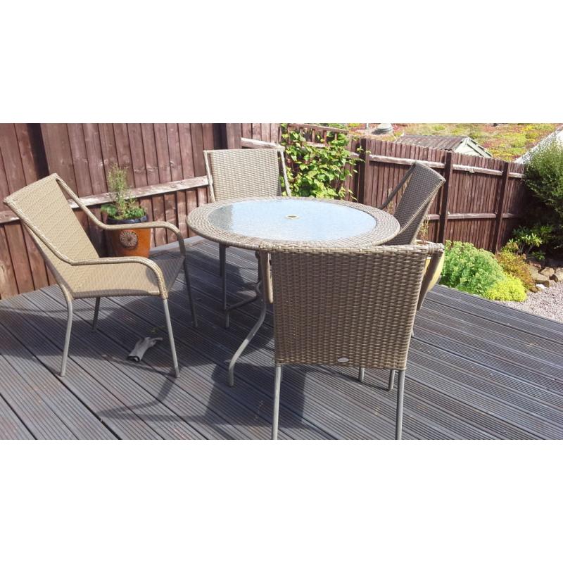 Rattan table and 4 chairs