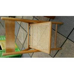 table and two folding chairs