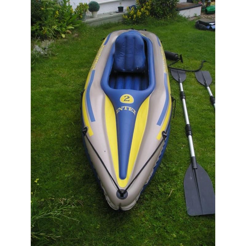 Inflatable 2 person Kayak,pump and oars.