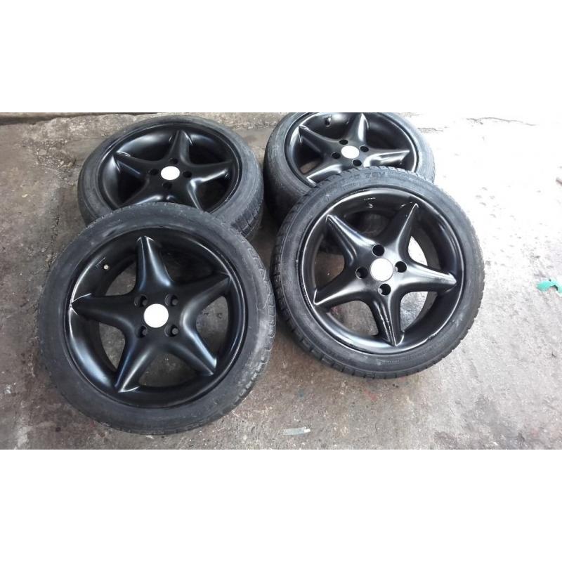 Vauxhall 4 stud black alloys 4x100 fitment. recently repainted tyres are bad one or two might do