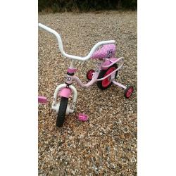 Girls pink bike Hello Kitty With 9" wheels and has stabilisers