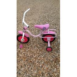 Girls pink bike Hello Kitty With 9" wheels and has stabilisers