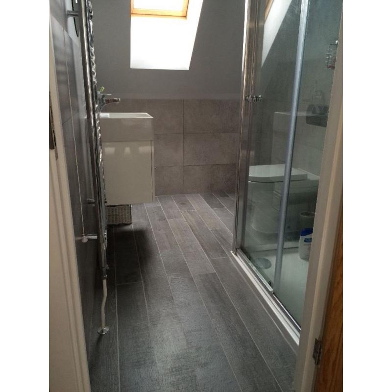 POrcelenoza Oxford floor tiles in 'Silver'