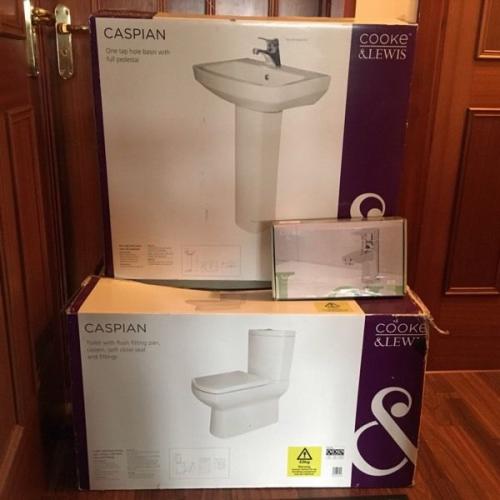 Toilet basin and tap