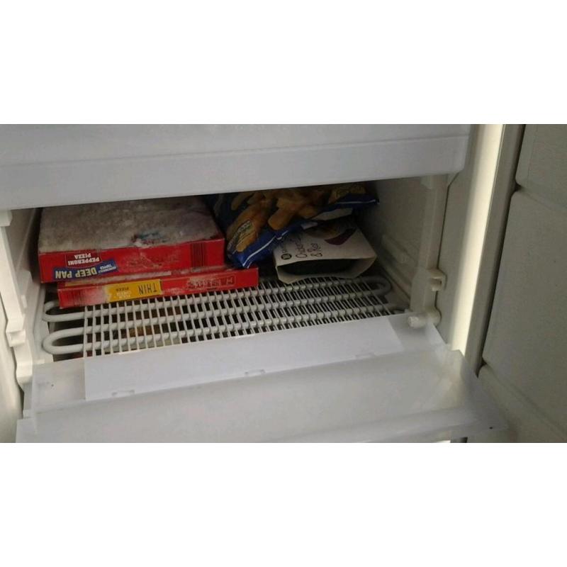 Freezer tall with draws in good working order. Can be seen working.
