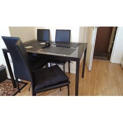 Dining table and 4 high backed chairs