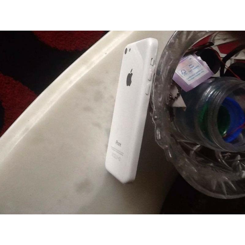 White iPhone 5c with little airline crack but hardly noticable in corner plus.....