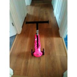 Pink scooter