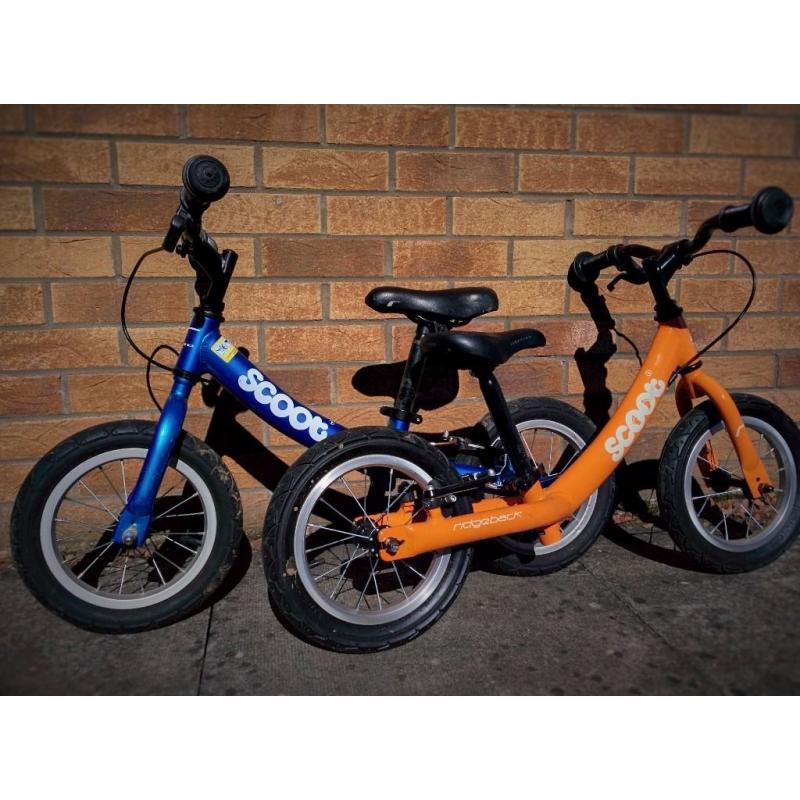Child's balance bikes - Scoot Blue & Scoot Orange in good condition - would suit twins