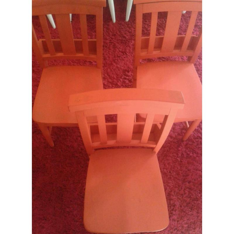 Wooden chairs orange
