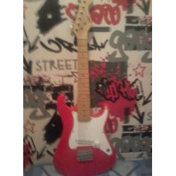 Red kids rock star electric guitar