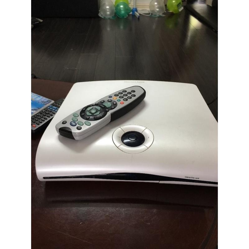 V good condition sky box with remote
